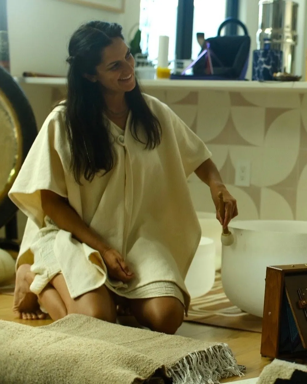 Jarin playing a crystal singing bowl